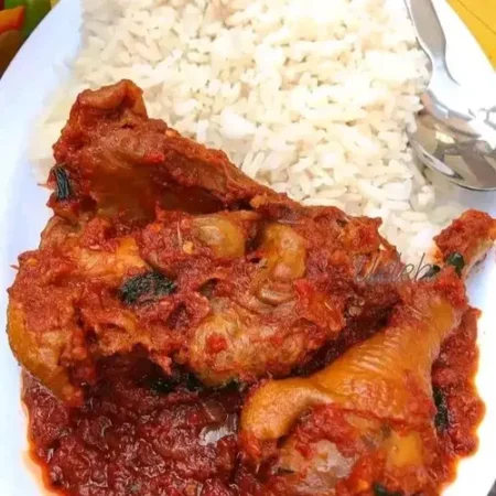 WHITE RICE WITH PLANTAIN SERVED WITH GOAT MEAT OR TURKEY