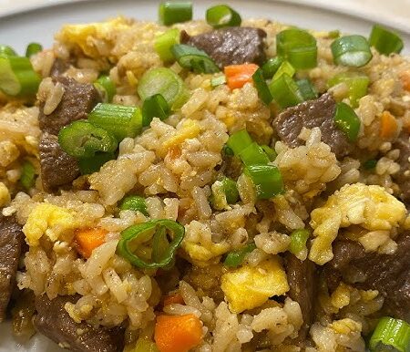 FRYIED RICE WITH PLANTAIN SERVED WITH BEEF/CHICKEN ASSORTED MEAT/FISH