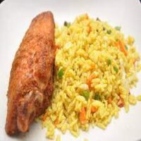 FRYIED RICE WITH PLANTAIN SERVED WITH GOAT MEAT OR TURKEY