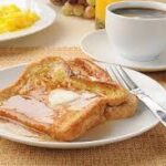 TOAST BREAD SERVED WITH SCRAMBLE EGG AND TEA MILK & SUGAR