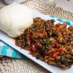 POUNDO SERVED WITH EFO RIRO/EGUSI/OGBONO/EWEDE/OKRO WITH TURKEY/GOAT MEAT
